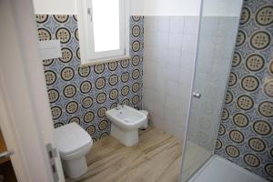 Koupelna v ubytování Oasi Guzzetta Hotel&Case Vacanze