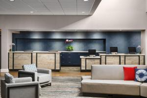 a waiting room with couches and chairs in a hospital at Hotel Caza Fisherman's Wharf in San Francisco