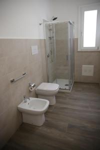 Koupelna v ubytování Oasi Guzzetta Hotel&Case Vacanze