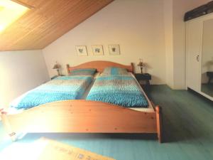 A bed or beds in a room at Im Inntal Dahoam