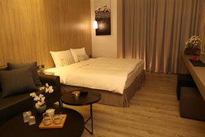 Voodi või voodid majutusasutuse Hotel Day Plus Teascape toas