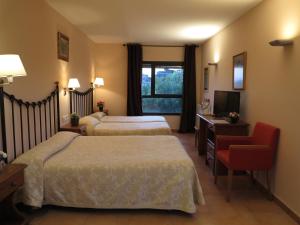 Postel nebo postele na pokoji v ubytování Hotel Era Conte