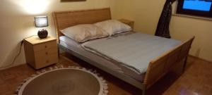 Ένα ή περισσότερα κρεβάτια σε δωμάτιο στο Apartment Hufnagl