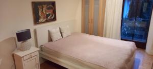 En eller flere senge i et værelse på Apartment Hufnagl