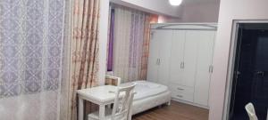 Postel nebo postele na pokoji v ubytování British Hotel