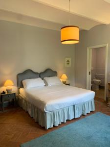 Katil atau katil-katil dalam bilik di Hotel Albergo Villa Marta