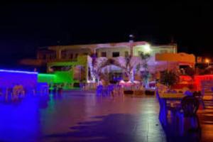 a blurry picture of a lit up parking lot at night at Casa Vacanze Simeri Mare in Simeri Mare
