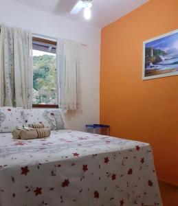 Cama ou camas em um quarto em Pousada Atobá Juquehy Apartamentos