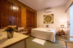 Un pat sau paturi într-o cameră la Villa Handam