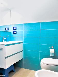 Kúpeľňa v ubytovaní Pietra Home, posto auto, AC ,WIFI, 150mt dal mare