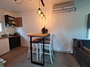 Kuchyň nebo kuchyňský kout v ubytování Luxor Apartmani 2
