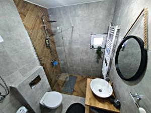 Koupelna v ubytování Luxor Apartmani 2 + 15 fotografií