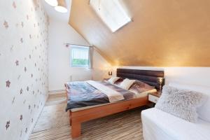 Postelja oz. postelje v sobi nastanitve Wellness Apartmány Andrea