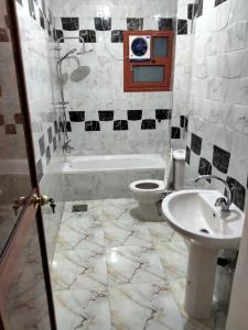 Kúpeľňa v ubytovaní Nile queen Apartments for Rent