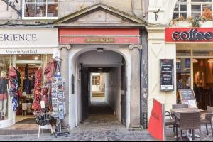 an entrance to a store on a city street at 4 New Assembly Close - Royal Mile in Edinburgh