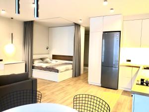 Posteľ alebo postele v izbe v ubytovaní OSapart Nice apartment in a complex Great Britain