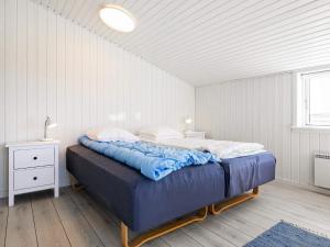 Ένα ή περισσότερα κρεβάτια σε δωμάτιο στο 10 person holiday home in Skagen