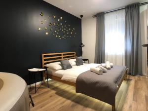 Posteľ alebo postele v izbe v ubytovaní Apartment Zagreb Jacuzzi