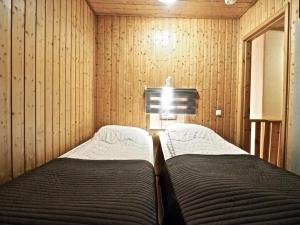 Ένα ή περισσότερα κρεβάτια σε δωμάτιο στο Levin Keskusta, Kätkäläinen B3 ja D1