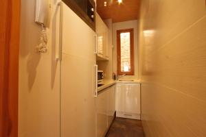 Η κουζίνα ή μικρή κουζίνα στο Apartamento Duplex Gomerez 39
