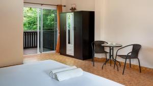 Postel nebo postele na pokoji v ubytování Bantung Resort