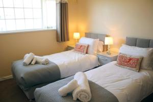 Postel nebo postele na pokoji v ubytování Carvetii - Uriah House - 4-Bedroom House sleeps up to 10 people