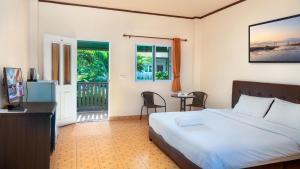 Postel nebo postele na pokoji v ubytování Bantung Resort