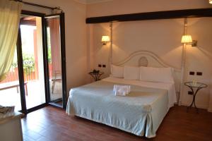Postel nebo postele na pokoji v ubytování Hotel Sa Contonera