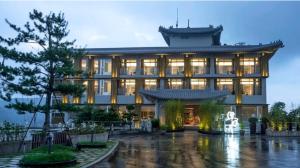 a large building with a lot of windows at Hotelday Sun Moon Lake in Yuchi