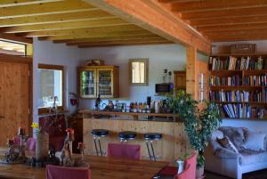 a kitchen and dining room with a table and chairs at Forstbauer in Millstatt