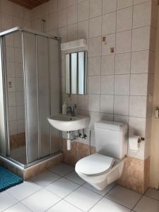 Koupelna v ubytování Chambres d'Hotes Le Passiflore