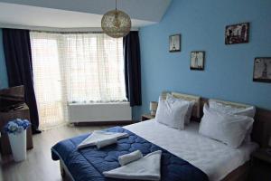 מיטה או מיטות בחדר ב-New & Comfortable home in Blagoevgrad center