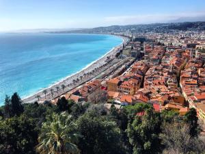 an aerial view of a city and the beach at La Maioneta Vieux-Nice in Nice +4 photos