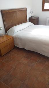 Postel nebo postele na pokoji v ubytování Casa la Era