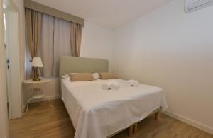 Postel nebo postele na pokoji v ubytování New Holiday Homes Ruzmarin