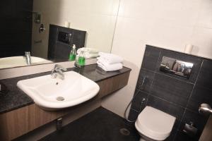 Koupelna v ubytování Hotel Sabareesh Park