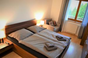 Posteľ alebo postele v izbe v ubytovaní NEW Apartment 120 Residence