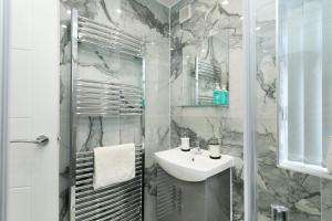 Ванная комната в Nottingham Serviced Accommodations