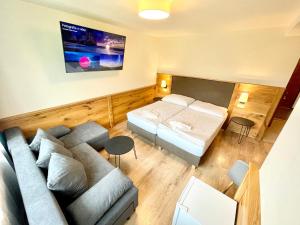 Postel nebo postele na pokoji v ubytování Villa Pinus Slovenský raj - Hotel Čingov dependance