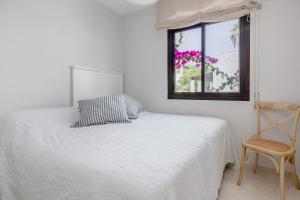 Posteľ alebo postele v izbe v ubytovaní Charming Beachside Townhouse in San Pedro A Lovely Retreat Steps from the Shore