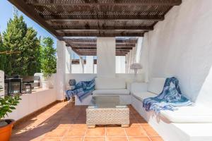 Posedenie v ubytovaní Charming Beachside Townhouse in San Pedro A Lovely Retreat Steps from the Shore