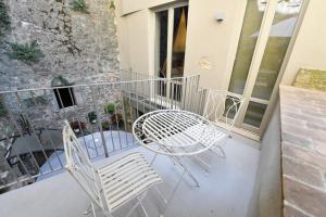 Balkón nebo terasa v ubytování Palazzo degli Stemmi