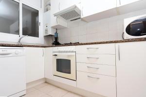 Kuchyňa alebo kuchynka v ubytovaní AT174 Apartamento en segunda línea de la playa, wifi