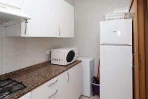 Kuchyňa alebo kuchynka v ubytovaní AT174 Apartamento en segunda línea de la playa, wifi