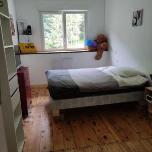 Säng eller sängar i ett rum på Les Lodges Du Pavillon F3