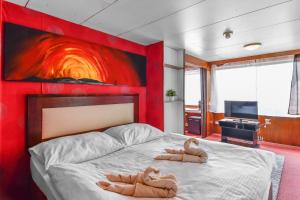Postel nebo postele na pokoji v ubytování Botel Vodnik