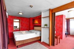 Postel nebo postele na pokoji v ubytování Botel Vodnik