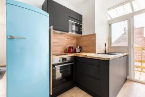 Dapur atau dapur kecil di Appartement Croisé Laroche 2 (12min de Lille) +10 gambar