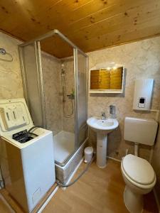 Ванная комната в Ferienhäuser 6 & 24