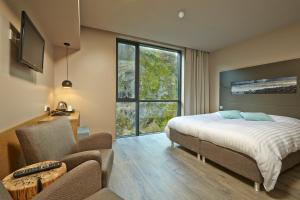 Ένα ή περισσότερα κρεβάτια σε δωμάτιο στο Hotel Vík í Mýrdal